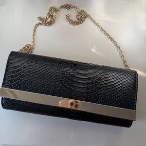 Elegant Black Snake-Embossed Clutch Gold Hardware